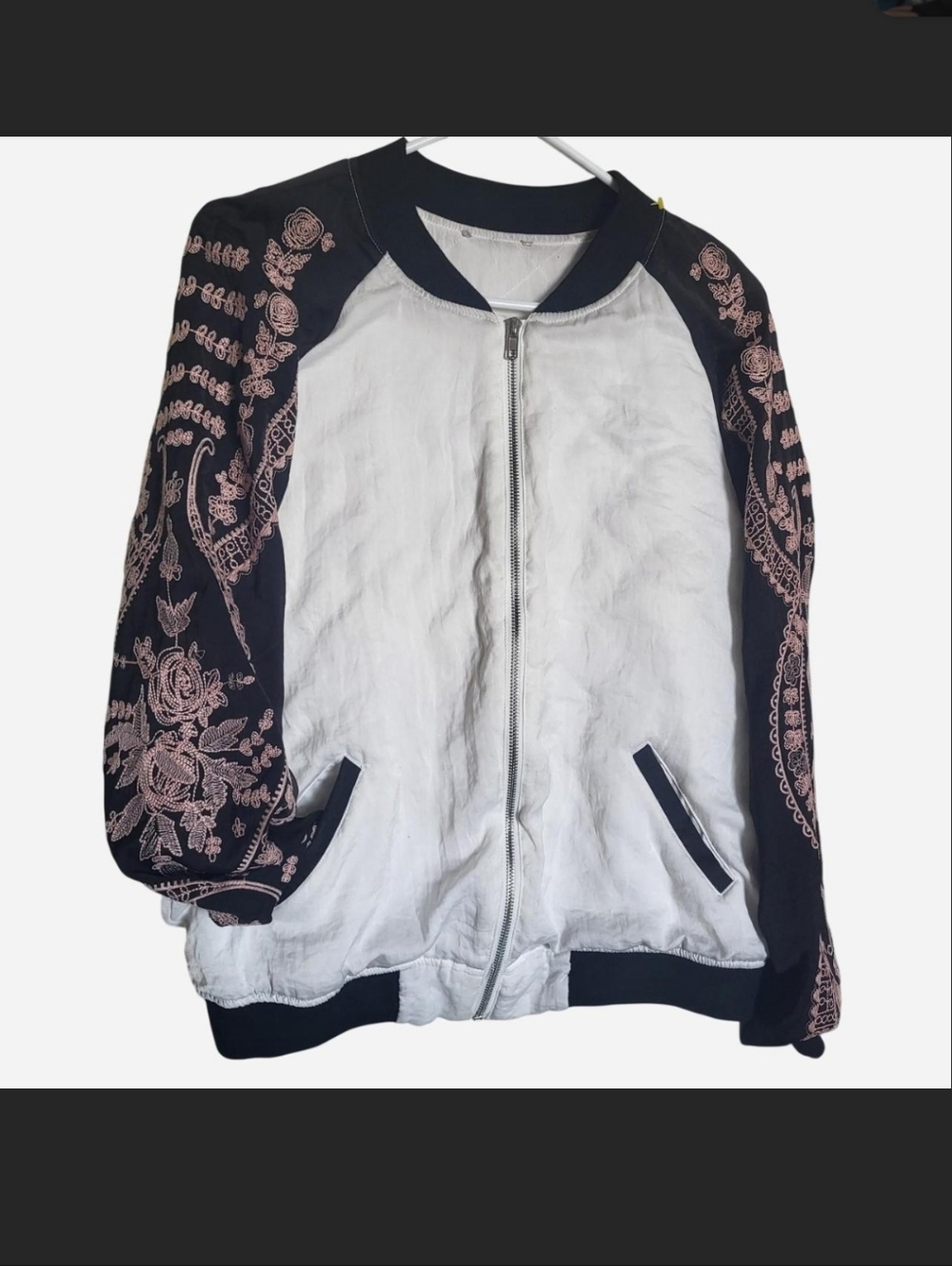 Maddie and Tae white and black bomber jacket with pink embroidered Sleeves